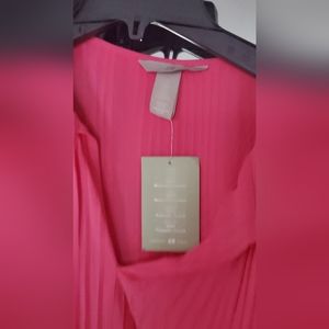Beautiful hot pink accordian style blouse